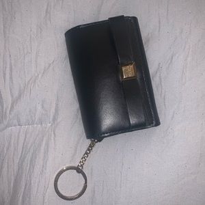 Small, cute Kate Spade keychain wallet with ID case.